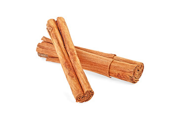 Two cinnamon sticks isolated on white background. Ceylon cinnamon.