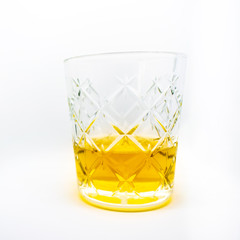 A beautiful glass of Irish wiskey an alcoholic beverage isolated on a white background