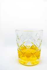 A beautiful glass of Irish wiskey an alcoholic beverage isolated on a white background