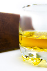 A beautiful glass of Irish wiskey an alcoholic beverage isolated on a white background