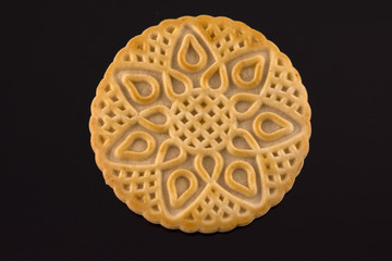 ,round, biscuit cracker  isolated on black  background