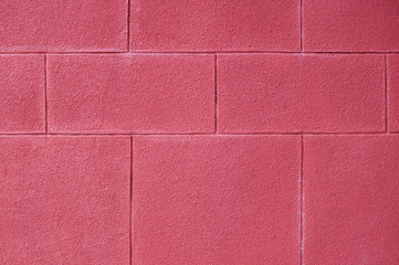 wall of brick painted red background. texture.