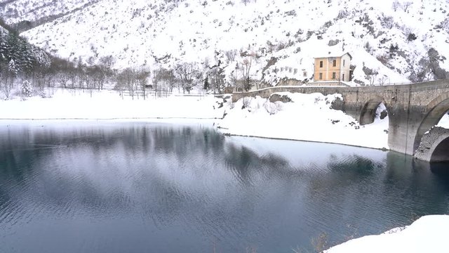 San Domenico lake near Villalago and Scanno during winter season. Abruzzo, central Italy.