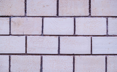 white decorative marble tiled brick wall. background, texture.