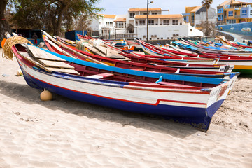 Naklejka na ściany i meble Old fishing pubes on the beach. Colorful boats on the beach of Cape Verde.