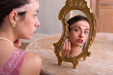 1920s lady and mirror