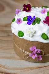 Sweet, traditional Easter bread, decorated with icing and flowers.  Kulich traditional