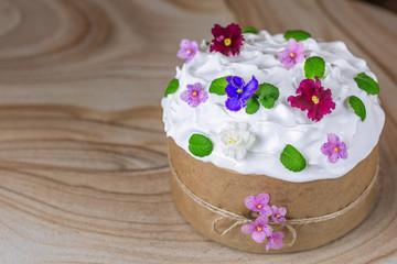 Sweet, traditional Easter bread, decorated with icing and flowers.  Kulich traditional