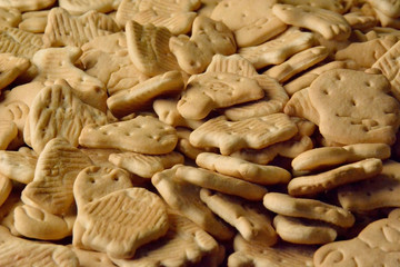 Cookies located on a flat surface occupies the entire area of the image.