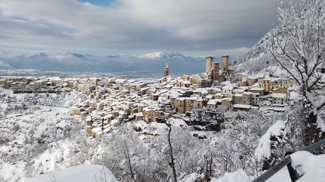Panoramic view of Pacentro covered in snow during winter season. Abruzzo, Italy.