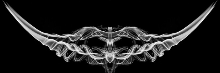 White smoke on black background