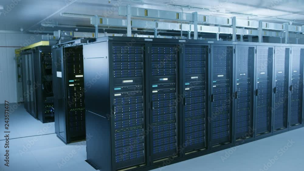 Leinwandbilder Descending Shot of Data Center With Multiple Rows of Fully Operational Server Racks. Modern Telecommunications, Cloud Computing, Artificial Intelligence, Database, Supercomputer Technology Concept.
