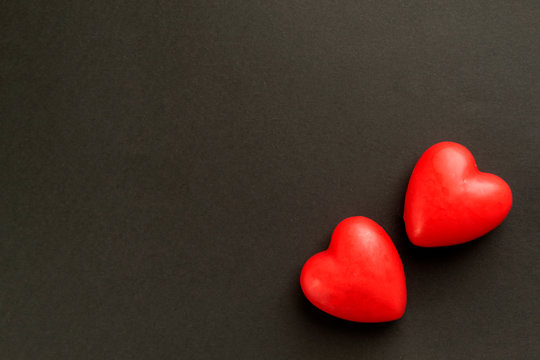 red hearts on dlack background
