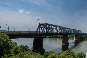 The Anghel Saligny Bridge (formerly King Carol I Bridge) spans the Danube near Cernavoda, Romania. may , 2017