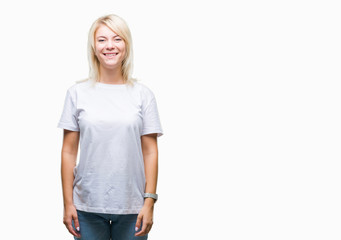 Obraz premium Young beautiful blonde woman wearing white t-shirt over isolated background with a happy and cool smile on face. Lucky person.
