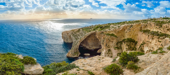 Blue Grotto, Malta. Natural stone arch and sea caves.