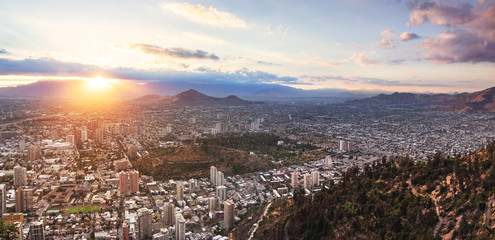 Panoramic aerial view of Santiago from San Cristobal Hill at sunset - Santiago, Chile