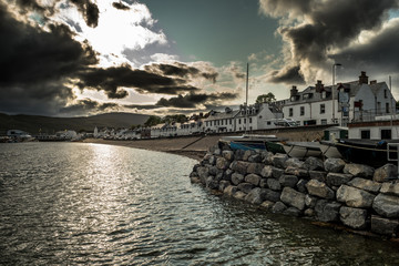 City Of Ullapool With Harbor And Boats Facing Heavy Weather At Loch Broom In Scotland