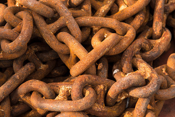 Fototapeta premium Detail Of Massive Rusty Chain In A Harbor