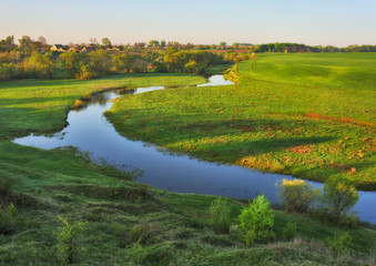 spring morning valley of the picturesque river. spring fog