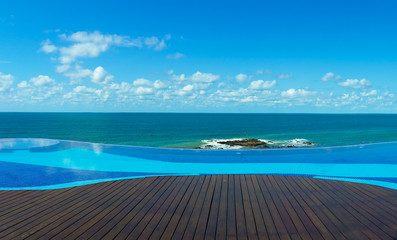 Fototapeta na wymiar Infinity pool overlooking the sea