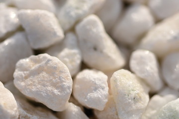 Fototapeta na wymiar small white stones texture as nice natural background