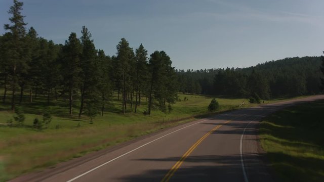 Driving along road in Black Hills, South Dakota