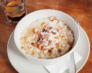 Healthy dessert - Sweet rice soup beautifully arranged on a wooden table