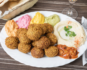 Arabic food, Falafel Humus Plate - Delicious humus plate, beautifully arranged vegetarian oriental spreads
