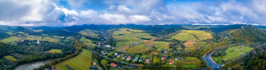 Fototapeta na wymiar Beautiful Bieszczady mountains and village view photographed from drone