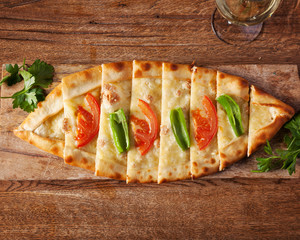 Arabic food, Peynirli Pide - Delicious vegetarian pide, beautifully arranged oriental pizza