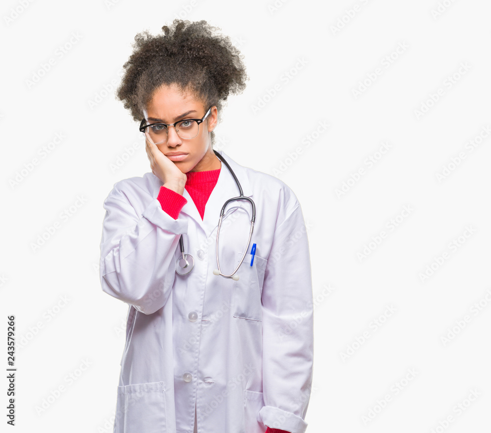 Sticker Young afro american doctor woman over isolated background thinking looking tired and bored with depression problems with crossed arms.