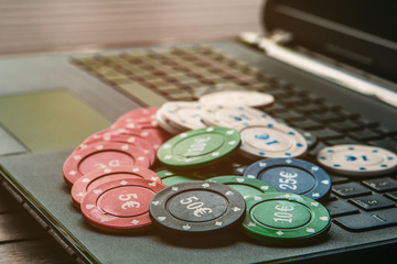 All in poker online concept. Plenty of poker cards on a tablet. Win money playing poker in Internet