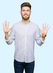 Young handsome man showing and pointing up with fingers number ten while smiling confident and happy.