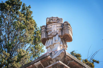 Fototapeta na wymiar Coatlicue Aztec godess decoration in a Tomb at Santiago Cemetery - Santiago, Chile