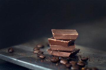 milk chocolate and coffee beans in kitchen for dessert making