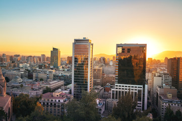 Fototapeta na wymiar Modern buildings in dowtown Santiago at sunset - Santiago, Chile