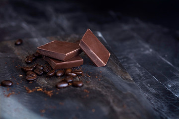 milk chocolate and coffee beans in kitchen for dessert making