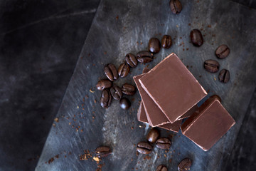 top view chocolate with coffee beans in kitchen for dessert cooking