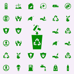 throwing garbage into the trash can green icon. greenpeace icons universal set for web and mobile