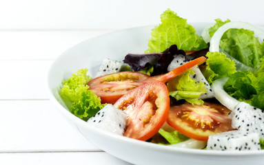 Healthy salad bowl on white wooden background, Have lunch time Healthy salad diet food, vegetarian diet, food and health concept.