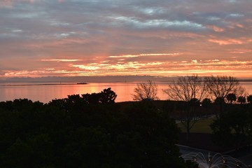 Fototapeta premium Sunrise over Charleston harbor in South Carolina
