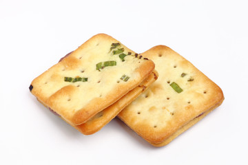 Scallion cookie nougats on white background