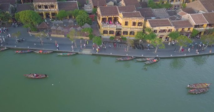 Aerial view panorama of Hoi An old town or Hoian ancient town. Royalty high-quality free stock video footage top view of Hoai river and boat traffic Hoian. Hoi An is the most popular travel in Vietnam