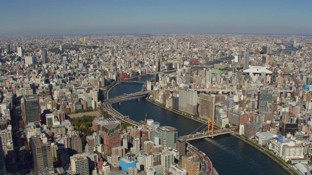 Tokyo, Japan circa-2018.  Flying over Sumida River.  Shot from helicopter with RED camera.