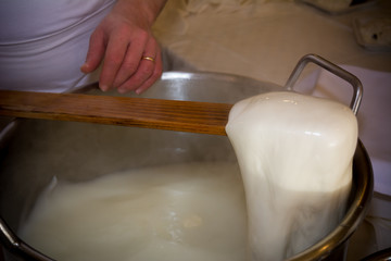 Fototapeta na wymiar Close Up of the Hand Made Preparation of Italian Traditional Cheese called Mozzarella