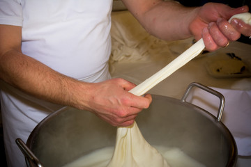 Close Up of the Hand Made Preparation of Italian Traditional Cheese called Mozzarella