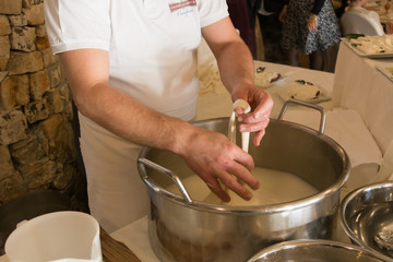 Close Up of the Hand Made Preparation of Italian Traditional Cheese called Mozzarella