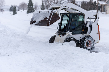Skid steer snow