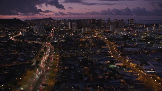 Honolulu, Oahu, Hawaii circa-2018, Aerial view of Honolulu and Waikiki at dusk. Shot with Cineflex and RED Epic-W Helium. 